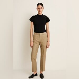 Machka black jersey short sleeve top with sleeve detail. Size Large